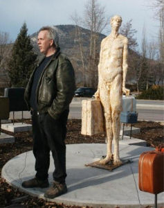 Artist Michael Hermesh and Frank the Baggage handler during a TV interview.
